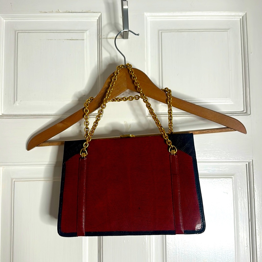 Vintage classic red Gucci shoulder with black, trim, rare find.
